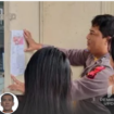 Seorang personel Polresta Pemalang, Jawa Tengah, sedang menempelkan selebaran DPO (Daftar Pencarian Orang) terhadap Haru Masiku, yang sudah 4 tahun burong. istagram@pemalang_updtae