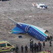 Patahan badan pesawat jenis Embraer 190, milik maskapai penerbangan Azerbaijen di bandara Aktau, Kashakstan. Tangkap layar video youtube@GenFun