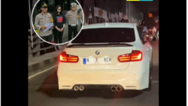 Petugas lalu lintas Polresta malang melakukan tilang kepada pengemudi BMW yang menggunakan plat palsu N 3 NEN. Instagram@infomania