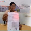 Dela Ahmad Arif, 30, warga Tunggorono, Jombang melaporkan ke Polres Jombang, mengaku tertipu Rp 34 juta untuk menukarkan uang baru Lebaran.  Dia menunjukkan surat laporan yang diterbitkan oleh Polres Jombang. Instagram@jombanginformasi_