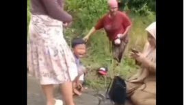 Seorang wanita guru SD yang memboceng anaknya menjadi korban begal bsenjata api dan cerlurit di desa Geger,  Bangkalan, Madura, Senin 21 April 2024. Tangkap layar video Instagram@info.newsantara