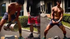 Angkat dumbel 100 kg satu lengan