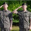 Anggota grup K-pop BTS Jimin (kanan) dan Jungkook memberi hormat setelah menyelesaikan wajib militer di Yeoncheon, Korea Selatan, 11 Juni 2025. Foto oleh AP