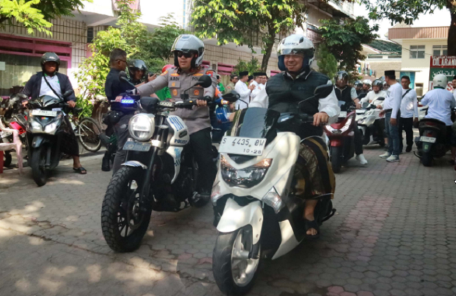 
					Pengurus PAC Ansor Jombang menyelenggaran acara Riding to Muassis, Minggu 15 Juni 2025, diikuti oleh ratusan santi bersama Frokompimda Jombang,  Bupati Jombang Warsubi dan Kapolres  AKBP Ardi Kuniawan. Foto; Jombang TV