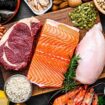 Overhead view of a large group of food with high content of healthy proteins. The composition includes salmon beef fillet, chicken breast, eggs, yogurt, mussels, chick peas, pistachios, cheese, brown lentild, beans, shrimps, canned tuna, pumpkin seeds, soybeans among others. High resolution 42Mp studio digital capture taken with SONY A7rII and Zeiss Batis 40mm F2.0 CF lens