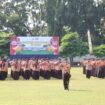 Upacara bendera memperingati HUT ke64 Pramuka, dilaksanakan di lapangan upcara Pemkab Jombang, kamis 14 Agustus 2025. Foto: jombangkab.go.id