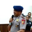 Kompol Cosmas saat di persidangan