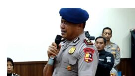 Kompol Cosmas saat di persidangan
