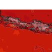 Citra satelit yang menunjukkan Pulau Jawa tampak memerah pada Oktober 2025 yang bertepatan dengan peralihan musim kemarau ke musim hujan.
© X/@Jateng_Twit