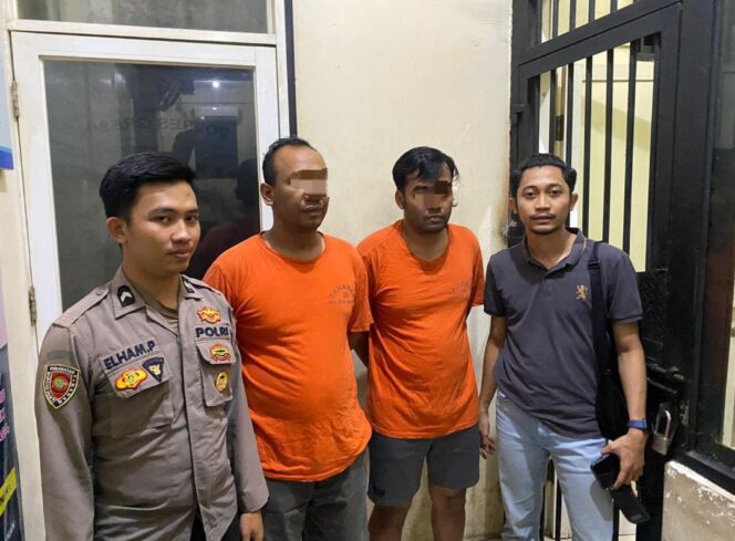 
					Foto:Istimewa
Dua tersangka FEP dan MJK di Mapolres Gresik