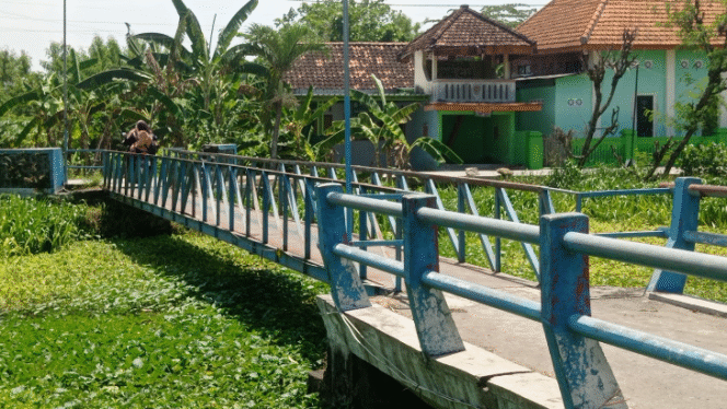 
					 Jembatan Kudubanjar, kecamatan Ngusikan Jombang yang gagal lelang tahun 2025. Foto: kredonews.com. elok aprianto