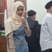 Dony Adi Saputra bersama istri, Nurul Fanisah dihadirkan dalam sidang dakwaan di Pn Surabaya atas kejahatan TPPU kasus Muzamil, Kepala Desa Lembung Gunong, Kecamatan Kokop, akrab disapa 