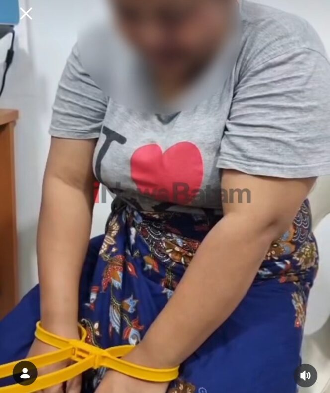 
					Seorang ibu tiri berinisial S,35, di Batam, kini ditahan di Polres Batam. Ia ditangkap 19 Juni 2026, atas tuduhan menganiaya bocah perempuan 9 tahun hingga babak belur. Foto: inewsbatam.id 